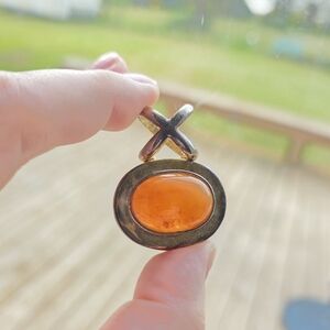 Cabochon Cut Orange Carnelian Oval Pendant with Cross Accent